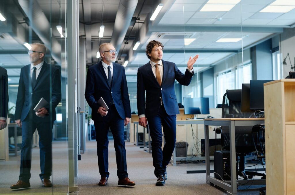 Managers in suits working at office